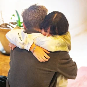 Happy Yoga Couple Hugging | Yogi Living Retreat Center