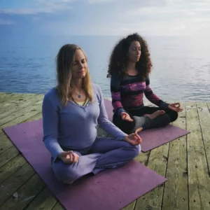 Two Yoginis Practicing Kundalini Yoga