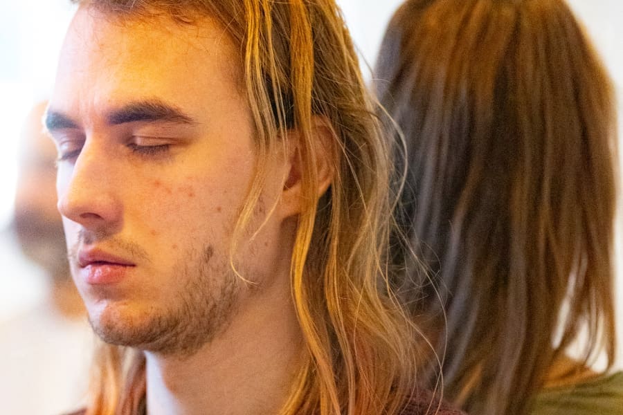 Couple in deep meditation during the Kundalini Tantra Yoga Retreat in Sweden, sharing stillness and spiritual connection