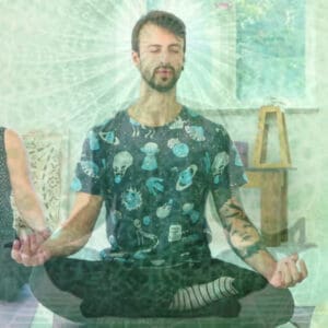 Man practicing Kundalini yoga during the Kundalini Awakening Retreat in Sweden, exploring meditation techniques and inner energy