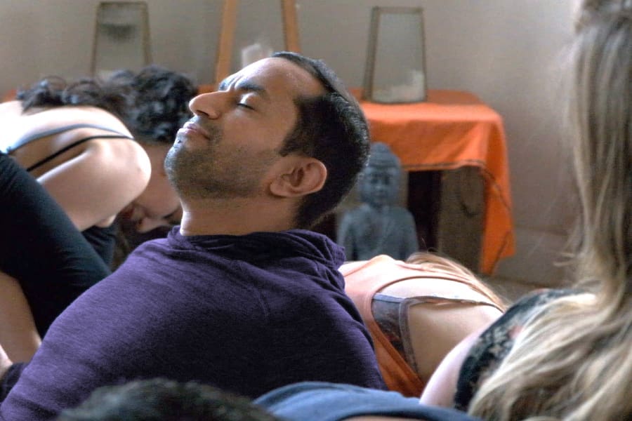 Group connection practice during a Tantra Yoga Retreat in Sweden, with participants radiating joy and presence