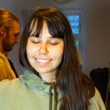 Smiling woman at kundalini yoga